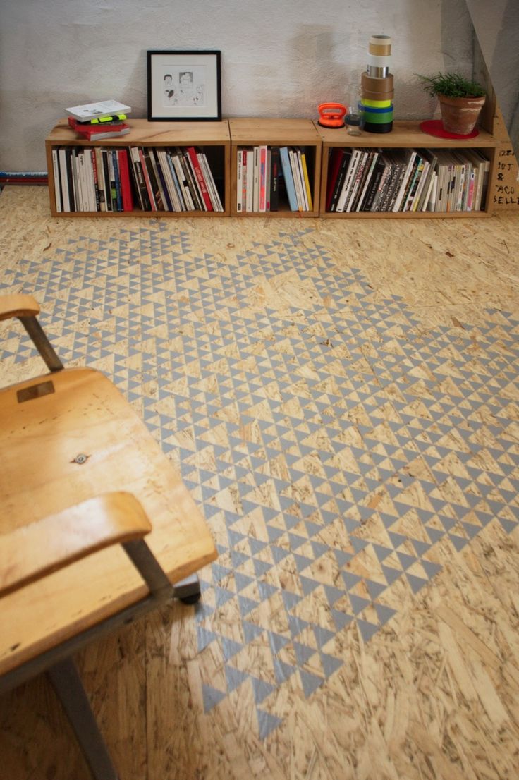 Stenciled pattern plywood floor