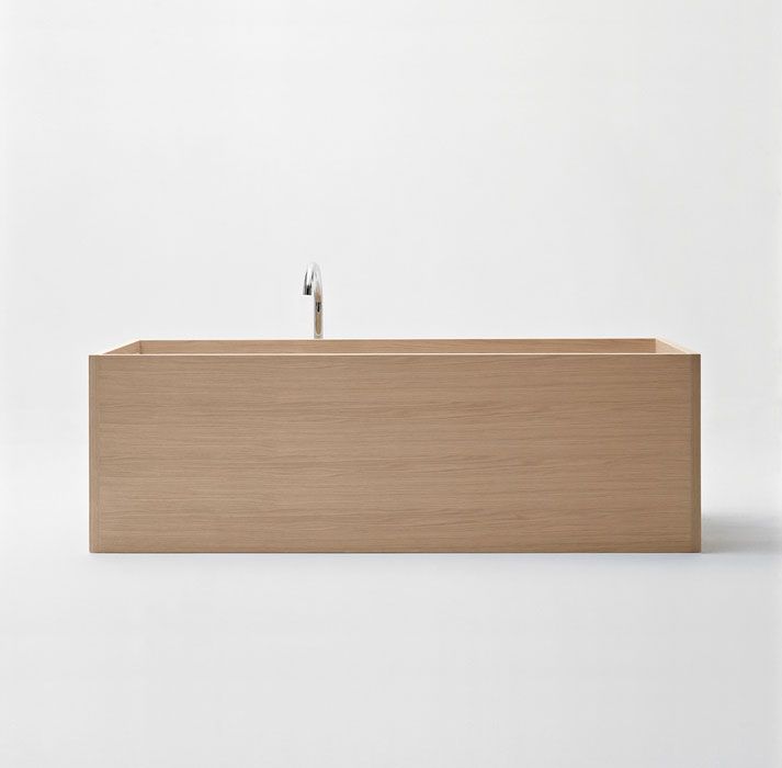 Even in this rectangular wooden bathtub by Unique Wood Design, the light wood and spare style evoke an Asian esthetic.