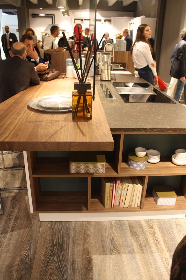 Wood countertops can match other wood surfaces and mix well with other materials as in this Arrex kitchen.