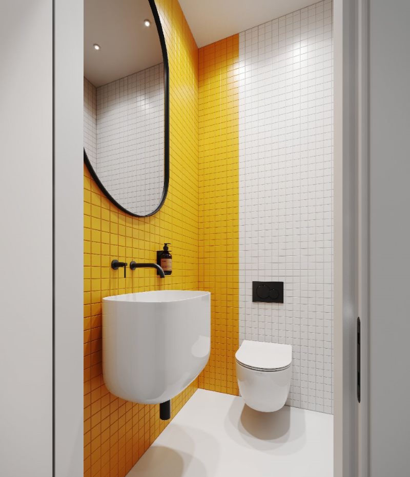 Интерьер туалета в желто-белом цвете