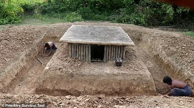 The underground house is given a roof, which is sealed using clay and fire. The two men then move on to creating their swimming pool moat