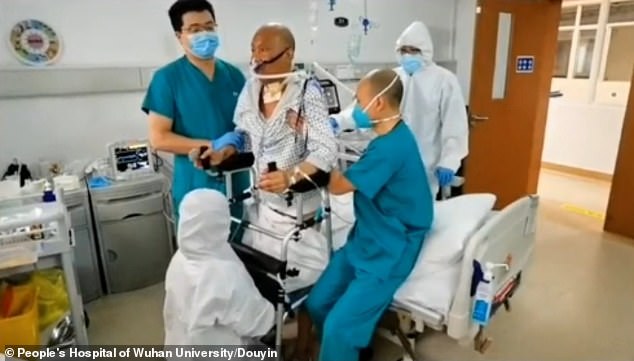 After the surgery, Mr Cui learned how to gain his muscle strength, standing and writing again