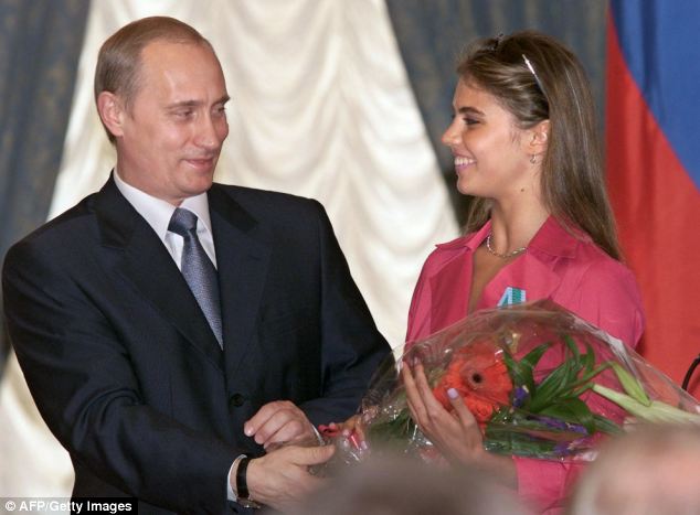Rumours flooded the internet that Russian President Vladimir Putin has married glamorous Olympic gymnast Alina Kabayeva, right