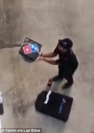 The deliveryman held his hands beneath the basket in case the pulley system failed (left), however it speedily reached the top without incident