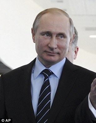 The publication claims rumors have been circulating around the world after the pair both got recent divorces. Putin (pictured on Tuesday) split from Lyudmila after 30 years of marriage in 2013