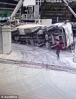 The driver opens the door and tries to escape but fails to make it in time