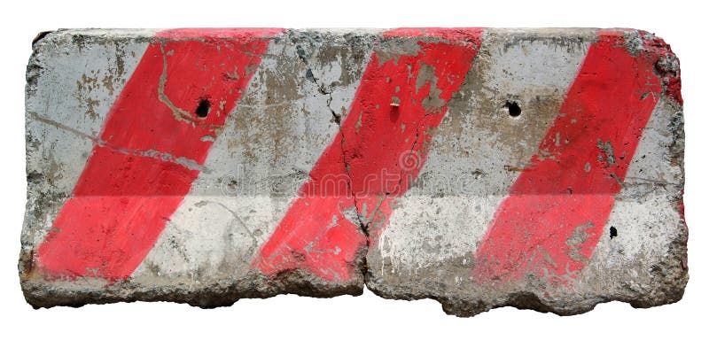 Red and white concrete barriers blocking the road. stock images