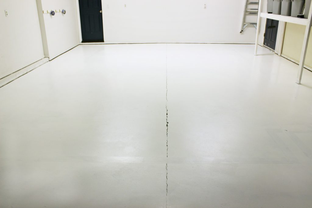 First coat of concrete floor paint