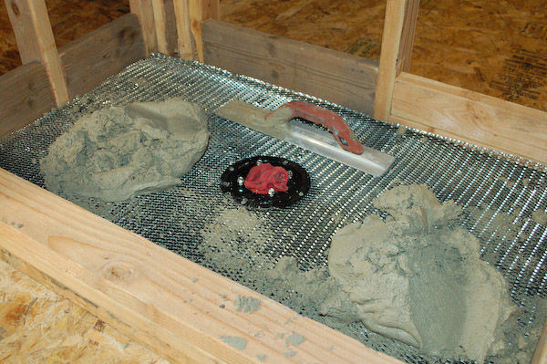 shower pan mortar placing
