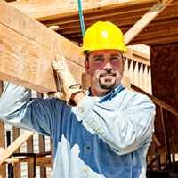 Construction Worker with Lumber